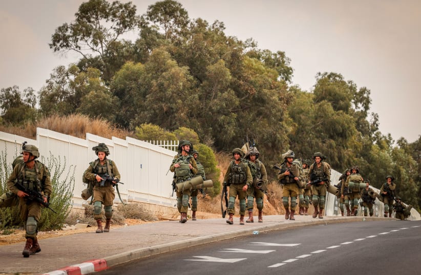  Israeli soldiers patrol in the southern Israeli city of Sderot, October 11, 2023 (photo credit: FLASH90/CHAIM GOLDBERG)