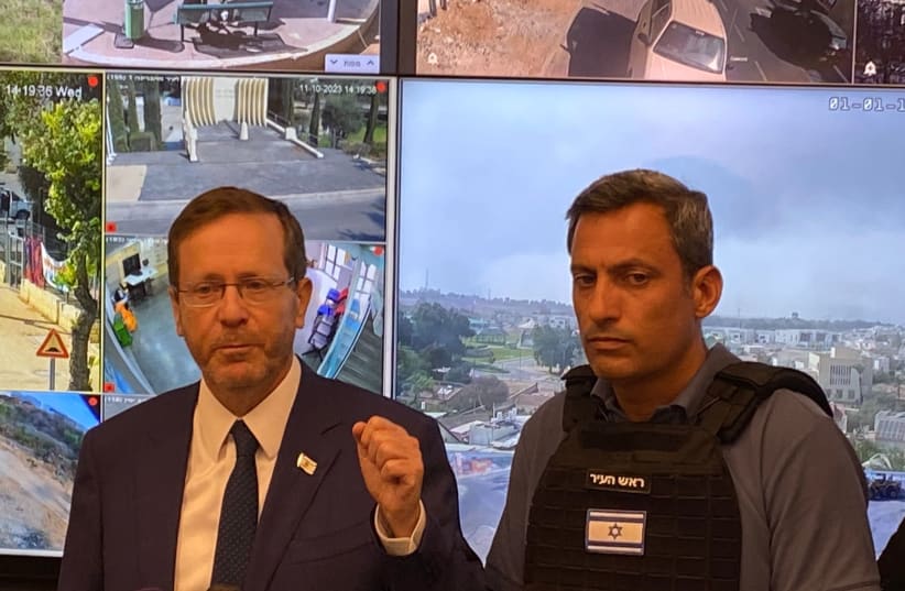  President Isaac Herzog and Sderot Alon Davidi on October 11, 2023 (photo credit: SETH J. FRANTZMAN)