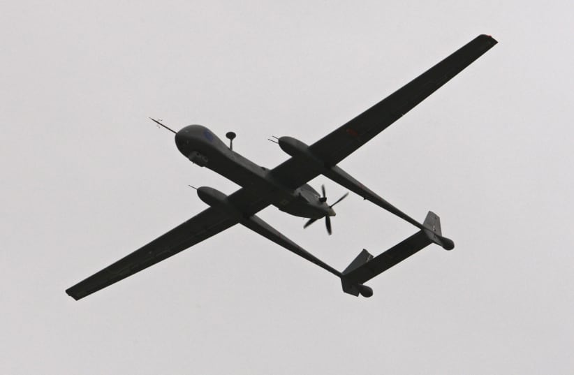 A Heron TP, also known as the IAI Eitan, surveillance unmanned air vehicle (UAV) flies during an official inauguration ceremony at Tel Nof Air Force Base near Tel Aviv February 21, 2010 (photo credit: Gil Cohen-Magen/Reuters)