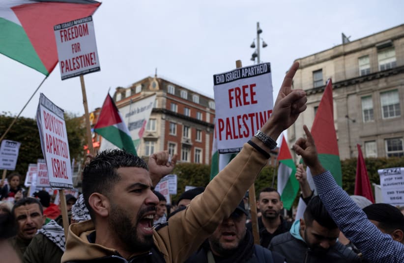  Pro-Palestinian demonstrators protest, in Dublin. (photo credit: REUTERS/CLODAGH KILCOYNE)