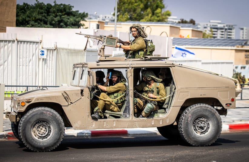  Israeli security forces patrol in the southern Israeli city of Sderot, October 11, 2023 (photo credit: OREN BEN HAKOON/FLASH90)