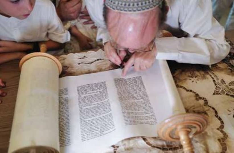  THE TORAH instills faith in the world and in humanity. (photo credit: MICHAEL GILADI/FLASH90)
