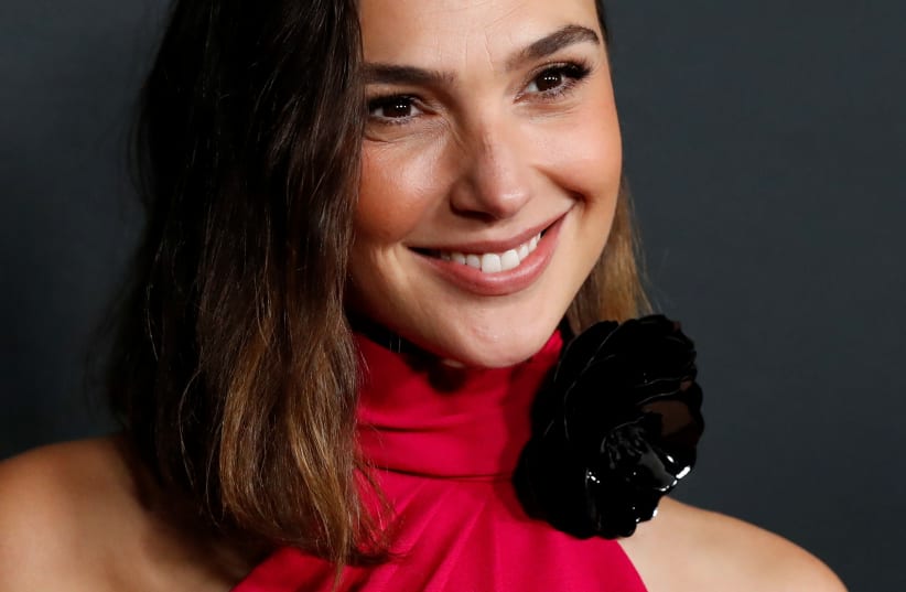  Honoree Gal Gadot attends the 27th annual ELLE Women in Hollywood Celebration at the Academy Museum of Motion Pictures in Los Angeles, California, U.S. October 19, 2021.  (photo credit: REUTERS/MARIO ANZUONI)