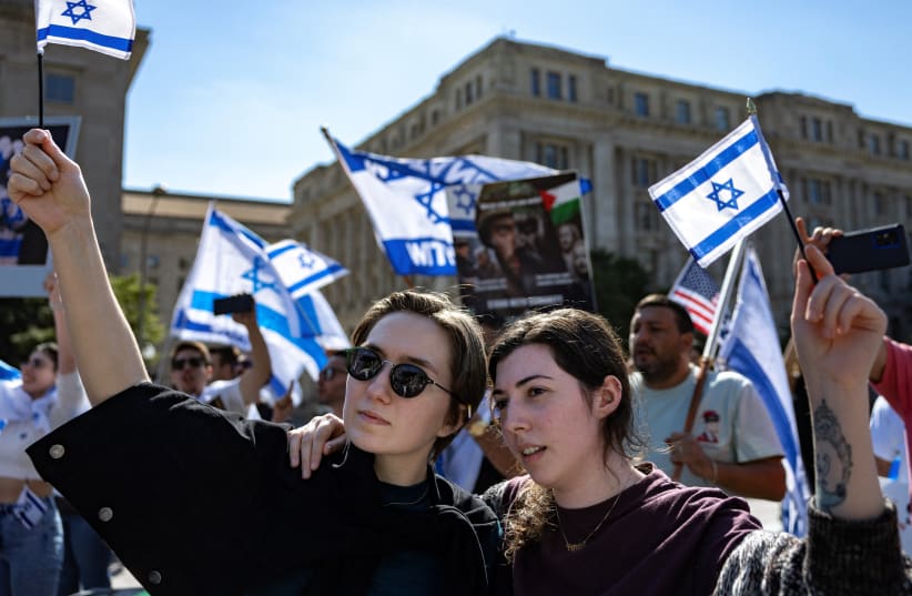   Kay and Hannah Dubrow attend a "Stand with Israel" rally at Freedom Plaza in Washington, U.S., October 13, 2023. (photo credit: REUTERS/EVELYN HOCKSTEIN)