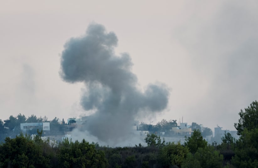  Smoke rises after Israeli shelling , as seen from Lebanese side, near the border with Israel, in Alma Al-Shaab, southern Lebanon, October 13, 2023 (photo credit: REUTERS/THAIER AL-SUDANI)