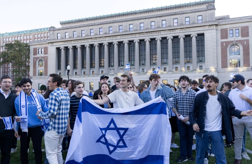  Pro-Israel students take part in a protest in support of Israel amid the ongoing conflict in Gaza, at Columbia University in New York City, US, October 12, 2023.  (photo credit: JEENAH MOON/REUTERS)