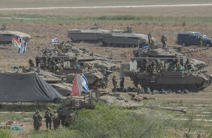  AN IDF staging area near the border with Gaza, on Saturday, October 14, 2023.  (photo credit: ERIC MARMOR/FLASH90)