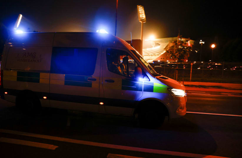  An ambulance drives near King Baudouin Stadium after the match between Belgium and Sweden was suspended following a shooting in Brussels, Belgium, October 17, 2023. (photo credit:  REUTERS/JOHANNA GERON)
