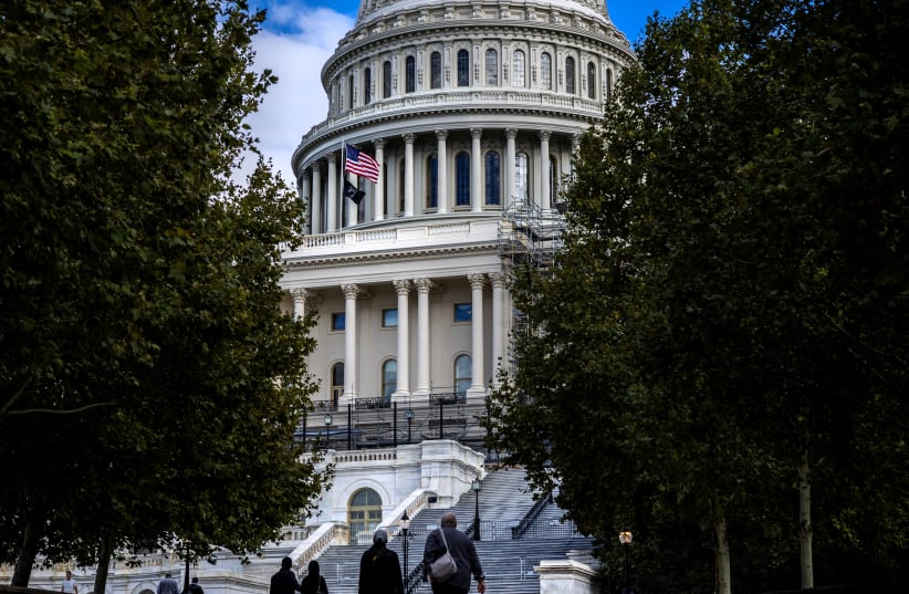  Visitors walk outside the U.S. Capitol building as House Republicans continue to work to choose a new Speaker of the House, in Washington, U.S., October 16, 2023. (photo credit: REUTERS/EVELYN HOCKSTEIN)