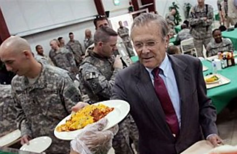 rumsfeld in iraq (photo credit: AP)