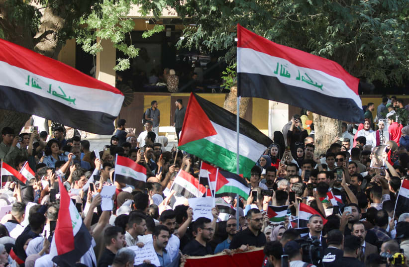  Iraqis students gather during a protest in support of Palestinians in Gaza as the conflict between Israel and Hamas continues, in Baghdad, Iraq, October 18 (photo credit: REUTERS/AHMED SAAD)