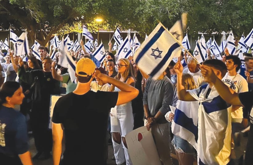  STUDENTS GATHER at a Chabad event, in support of Israel, at Arizona State University. (photo credit: ASU Chabad)