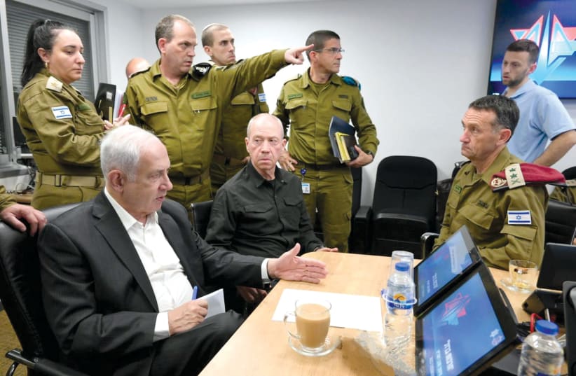  Prime Minister Benjamin Netanyahu holds an operational assessment with Defense Minister Yoav Gallant, IDF Chief of Staff Lt.-Gen. Herzi Halevy, and senior IDF officials in Tel Aviv on October 8. (photo credit: AMOS BEN-GERSHOM/GPO)