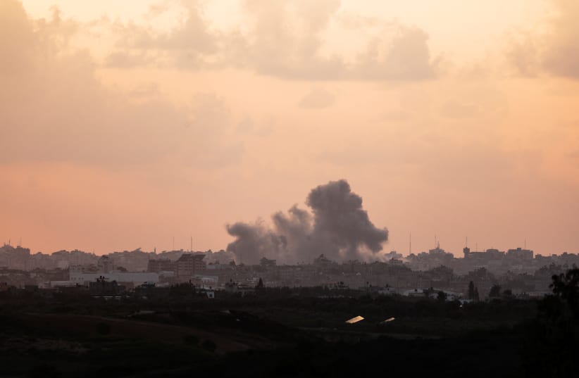  A view shows smoke in the Gaza Strip as seen from Israel's border with the Gaza Strip, in southern Israel October 19, 2023 (photo credit: AMIR COHEN/REUTERS)