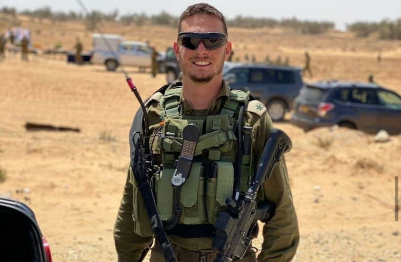  Yuval De Paz after reporting for duty with the 5th Givati Reserve Brigade. (photo credit: IDF SPOKESPERSON UNIT)