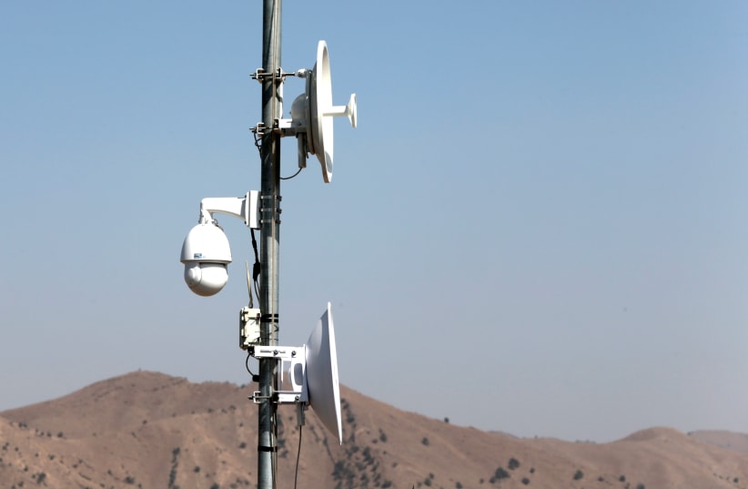  Electronic surveillance equipment is seen along the border fence outside the Kitton outpost on the border with Afghanistan in North Waziristan, Pakistan October 18, 2017. (photo credit: REUTERS/CAREN FIROUZ)