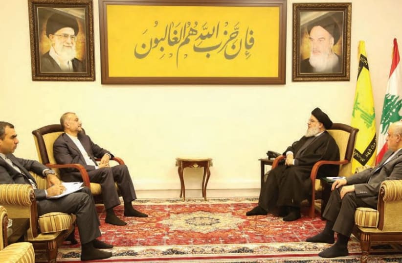  HEZBOLLAH LEADER Hassan Nasrallah meets with Iranian Foreign Minister Hossein Amir-Abdollahian in Lebanon. (photo credit: Hezbollah Media Office/Reuters)