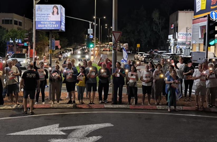 Israeli's in Haifa hold candlelit vigil, October 21, 2023 (photo credit: AVSHALOM SASSONI/MAARIV)
