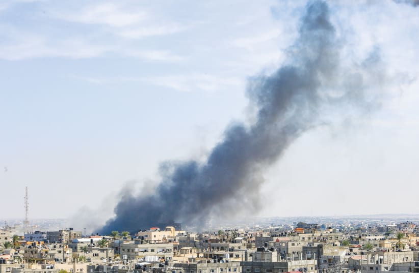  SMOKE RISES amid Israeli air strikes in Rafah, in the southern Gaza Strip. (photo credit: ABED RAHIM KHATIB/FLASH90)