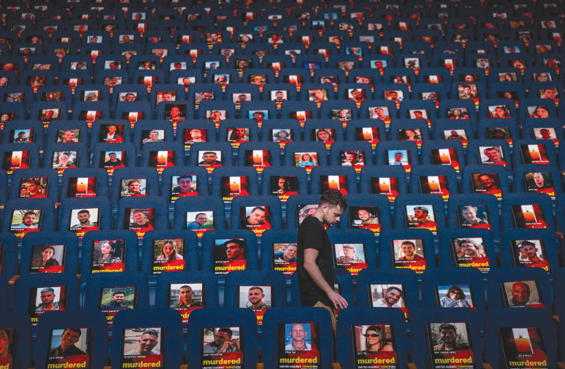  PHOTOS OF those abducted, missing, or killed in the Hamas terrorist attack of October 7, in southern Israel, are displayed in the Smolarz Auditorium at Tel Aviv University. (photo credit: YONATAN SINDEL/FLASH90)