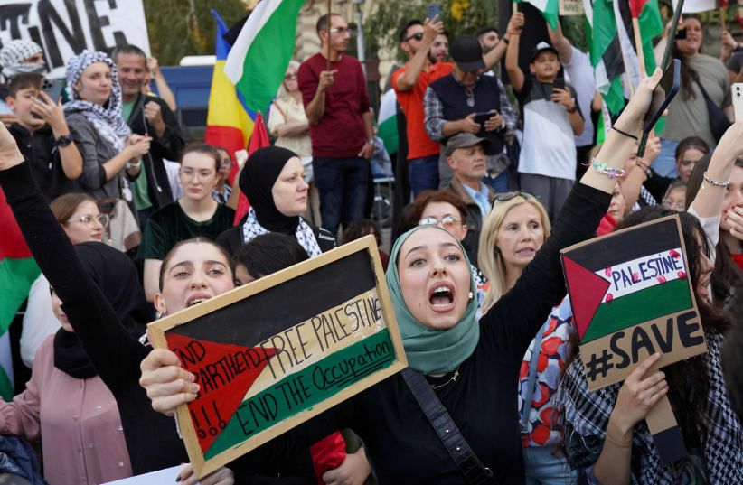  People chant, "Free Palestine", at a protest in support of Palestinians, in Bucharest, Romania, October 21, 2023. (photo credit: REUTERS/Andreea Campeanu)