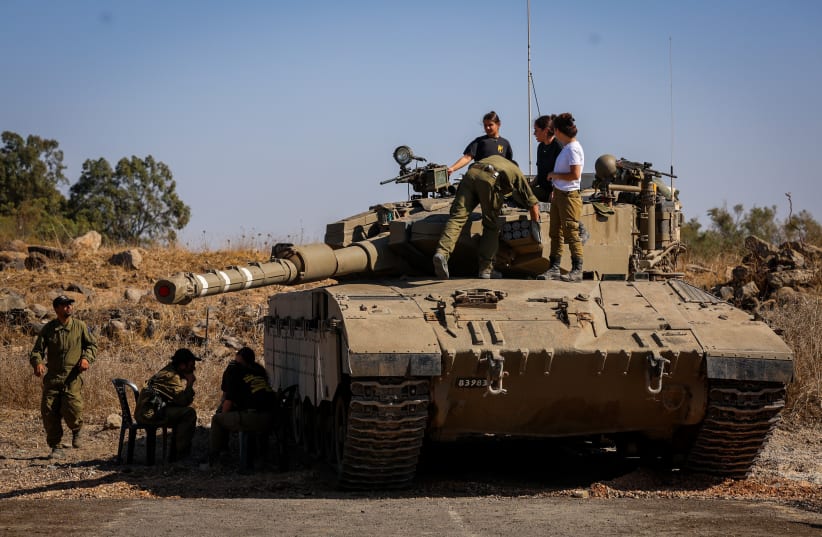  Israeli soldiers seen at a staging area near the Israeli border with Syria, northern Israel, October 25, 2023 (photo credit: David Cohen/Flash90)