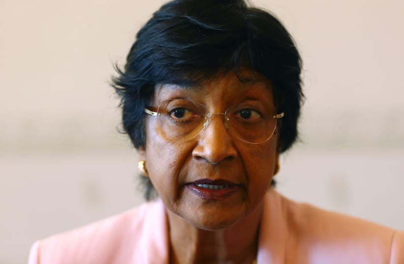 Outgoing U.N. Human Rights Commissioner Navi Pillay talks during an interview to Reuters in her office in Geneva August 19, 2014.  (photo credit: REUTERS/RUBEN SPRICH)