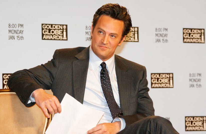  Actor Matthew Perry waits to announce nominations at Golden Globes news conference in Beverly Hills (photo credit: REUTERS)