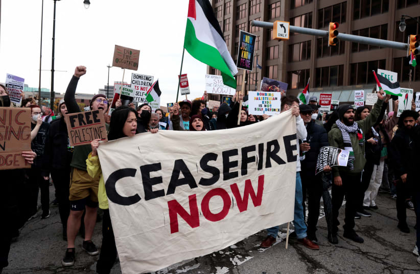  Demonstrators from ‘Jewish Voice for Peace’ and their supporters rally for a ceasefire in Gaza, outside the Federal building in Detroit, Michigan U.S. October 25, 2023.  (photo credit: REUTERS/REBECCA COOK)
