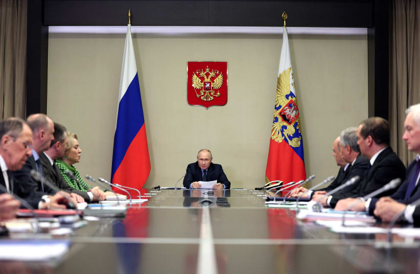  Russian President Vladimir Putin chairs a meeting of members of his Security Council and the government and the heads of law enforcement agencies, at the Novo-Ogaryovo state residence outside Moscow, Russia October 30, 2023 (photo credit: SPUTNIK/GAVRIIL GRIGOROV/POOL VIA REUTERS)