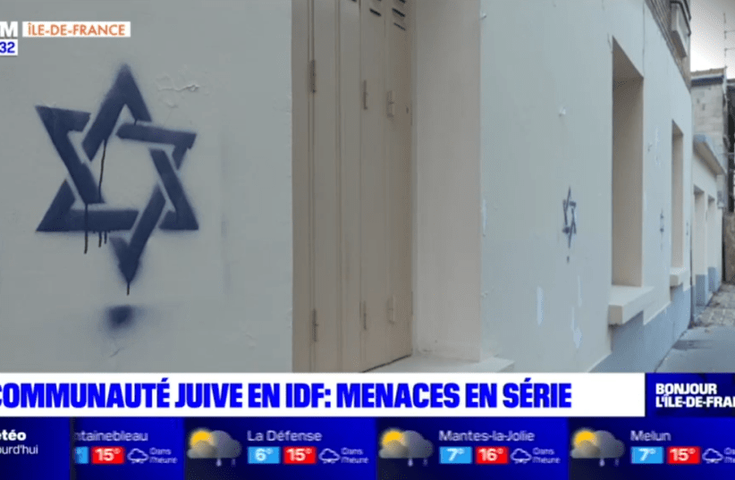  Stars of David are seen graffitied onto French homes in this TV broadcast screenshot. (photo credit: Screenshot BFMTV)