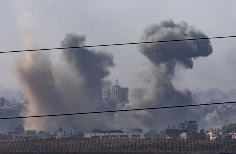  Smoke rises following an Israeli strike inside the Gaza Strip, as seen from Israel, October 31, 2023.  (photo credit: REUTERS/EVELYN HOCKSTEIN)