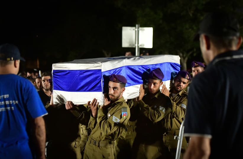  Family and friends of Israeli soldier Itay Yehuda mourn at his funeral at the Military cemetery in Holon, on November 1, 2023, Yehuda was killed during a ground operation in the Gaza Strip. (photo credit: AVSHALOM SASSONI/FLASH90)