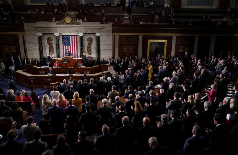 Newly elected Speaker of the House Mike Johnson (R-LA) gets a standing ovation from Republican members of the House as he addresses members after being elected to be the new Speaker of the House at the US Capitol in Washington, US, October 25, 2023 (photo credit: Elizabeth Frantz/Reuters)