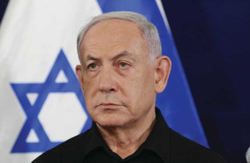  PRIME MINISTER Benjamin Netanyahu speaks at a press conference at the Defense Ministry in Tel Aviv. (photo credit: Dana Kopel/Pool)