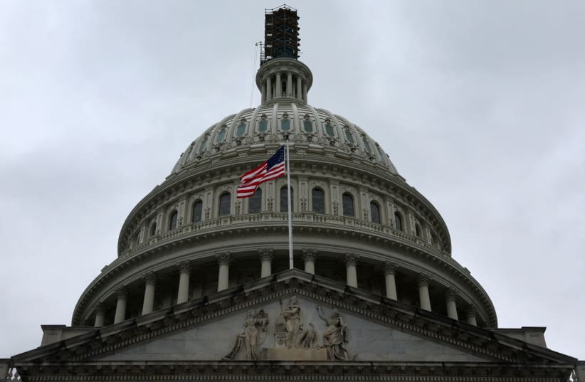   The dome of the U.S. Capitol building is seen on a rainy day, September 23, 2023. (photo credit: REUTERS/LEAH MILLIS)