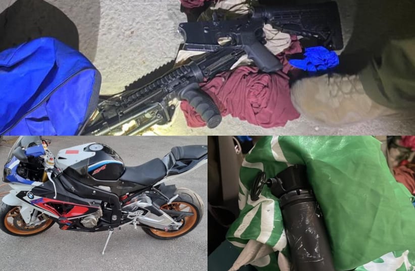  The IDF and Shin Bet confiscated weapons and a stolen motorcycle in an overnight raid in the West Bank. (photo credit: IDF)