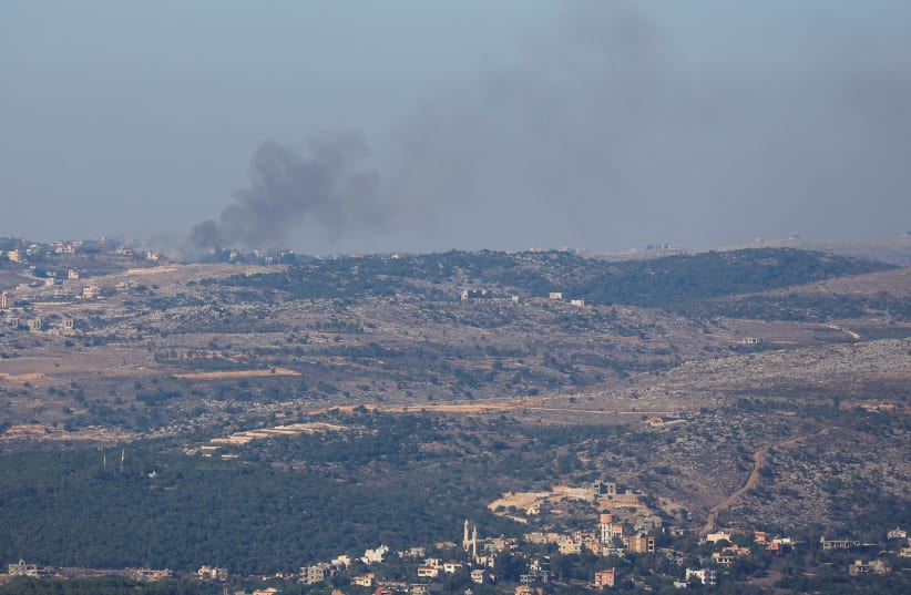  Smoke rises over a part of Lebanon, as seen from Israel's border with the country, in northern Israel, November 5, 2023 (photo credit: REUTERS/ALEXANDER ERMOCHENKO)