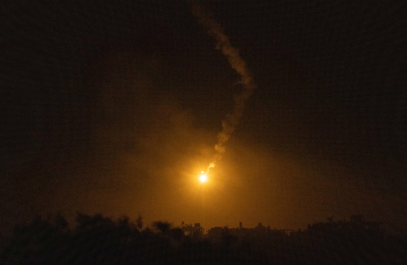  A flare dropped by the Israeli army in the Gaza Strip, as seen from the Israeli side of the border, on November 3, 2023. (photo credit: YONATAN SINDEL/FLASH90)