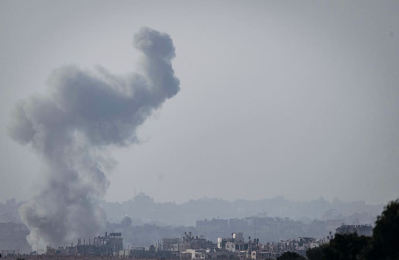  SMOKE RISES during Israeli air strikes in the Gaza Strip, as seen from the Israeli side of the border. (photo credit: Chaim Goldberg/Flash90)