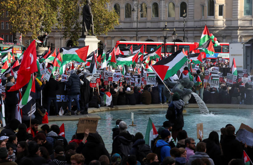 Demonstrators gather at Trafalgar Square as they protest in solidarity with Palestinians in Gaza, amid the ongoing conflict between Israel and the Palestinian Islamist group Hamas, in London, Britain, November 4, 2023. (photo credit: REUTERS/TOBY MELVILLE)