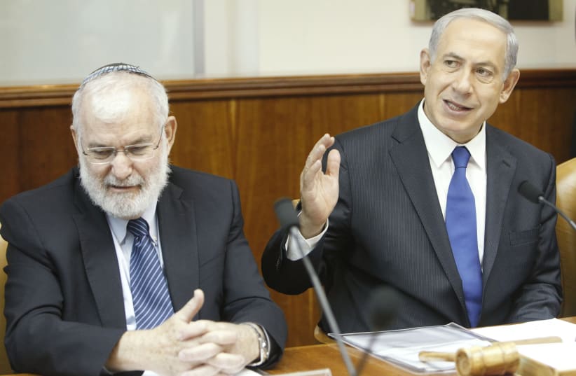 Prime Minister Benjamin Netanyahu (R) seen with then-National Security Council head Yaakov Amidror during the weekly cabinet meeting at in Jerusalem on November 3, 2013 (photo credit: MIRIAM ALSTER/FLASH90)