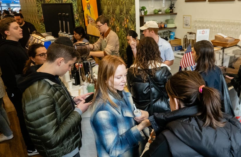 Customers pack into Caffe Aronne in the Upper East Side after staff members quit due to the store's pro-Israel activities, Nov. 7, 2023. (photo credit: LUKE TRESS)
