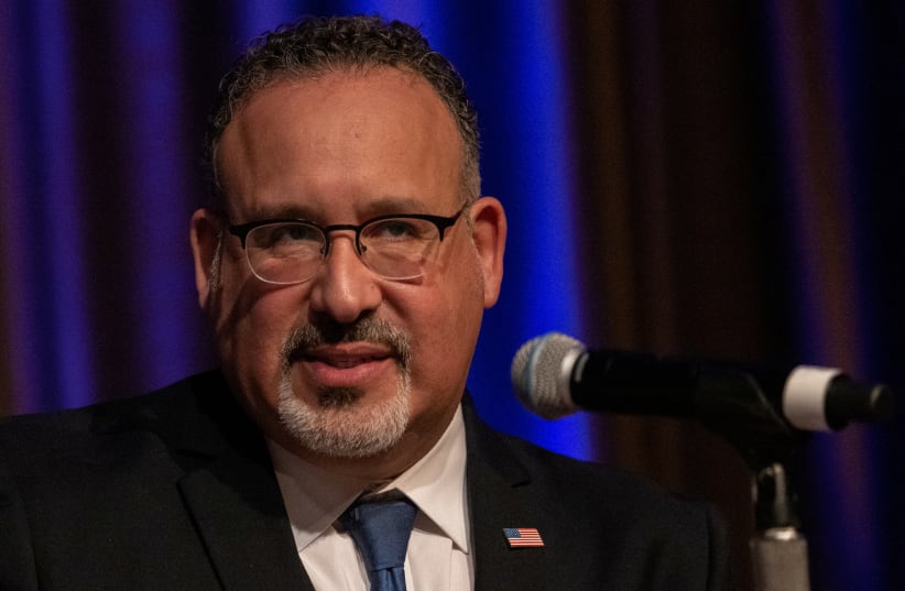  Secretary of Education Dr. Miguel Cardona speaks during the National Action Network National Convention in New York, U.S., April 12, 2023. (photo credit: REUTERS/JEENAH MOON)