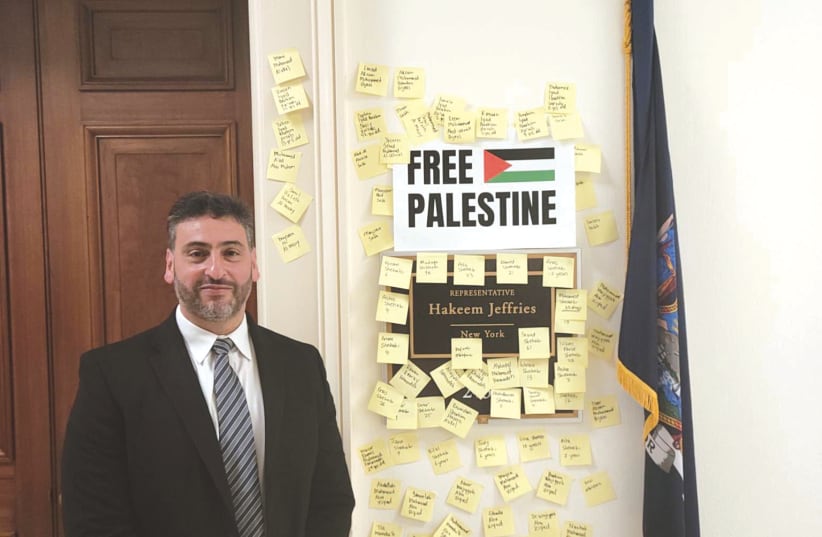  OSAMA ABUIRSHAID, executive director of American Muslims for Palestine, poses for a photo after activists defaced the office entryway of House Minority Leader Hakeem Jeffries (D-NY). (photo credit: Osama Abuirshaid/Twitter)
