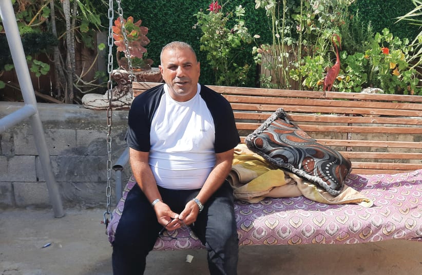  MINIVAN DRIVER Yosef El Zaidneh, 47, of the unrecognized neighborhood Ziadna, risked his life to save people from Supernova and has become an unlikely media hero – after one of the rescued praised him and posted his phone number on social media to bring him more customers. (photo credit: JUDITH SUDILOVSKY)