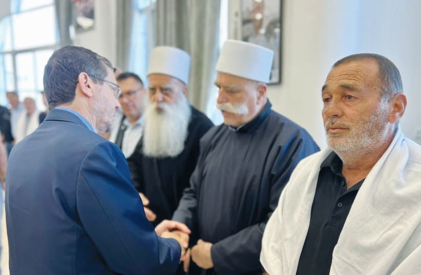  PRESIDENT ISAAC HERZOG pays a condolence call to the Druze community. (photo credit: Courtesy President’s Spokesman’s Office)