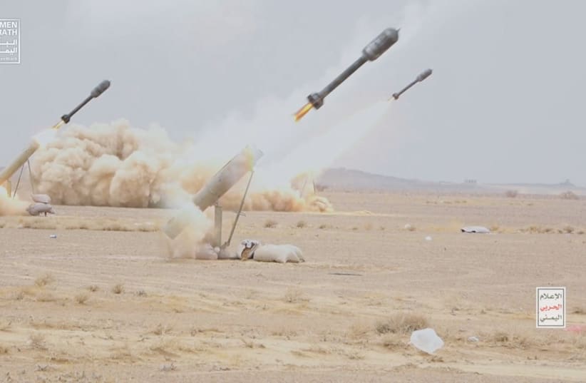  PROJECTILES ARE launched during a military maneuver near Sanaa, Yemen, last week. (photo credit: Houthi Media Center/Reuters)
