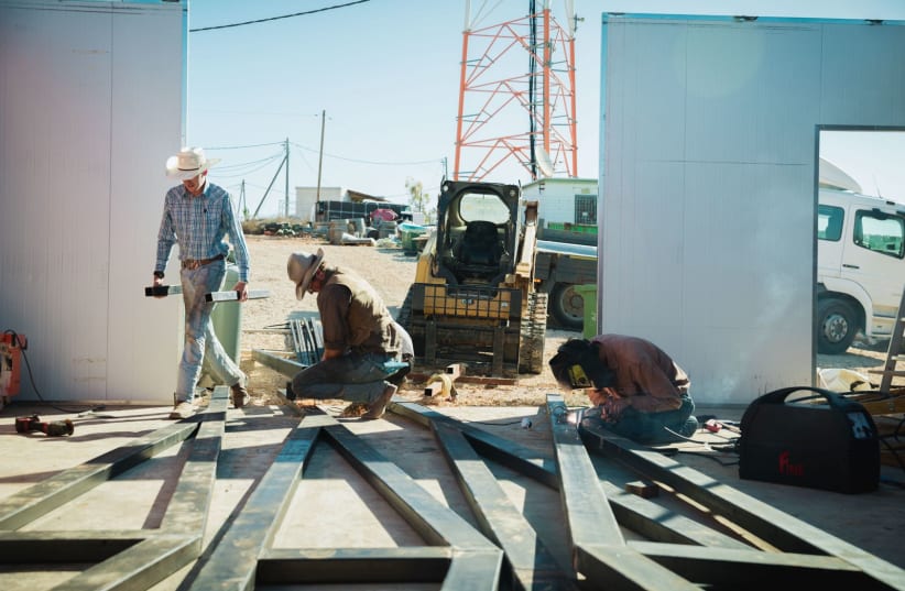  American cowboys helping with construction in the West Bank. (photo credit: HAYOVEL)