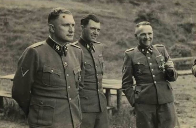 Richard Baer, Josef Mengele, and Rudolf Hoss - all perpetrators of Nazi health experiments (photo credit: US HOLOCAUST MUSEUM via LANCET COMMISSION)